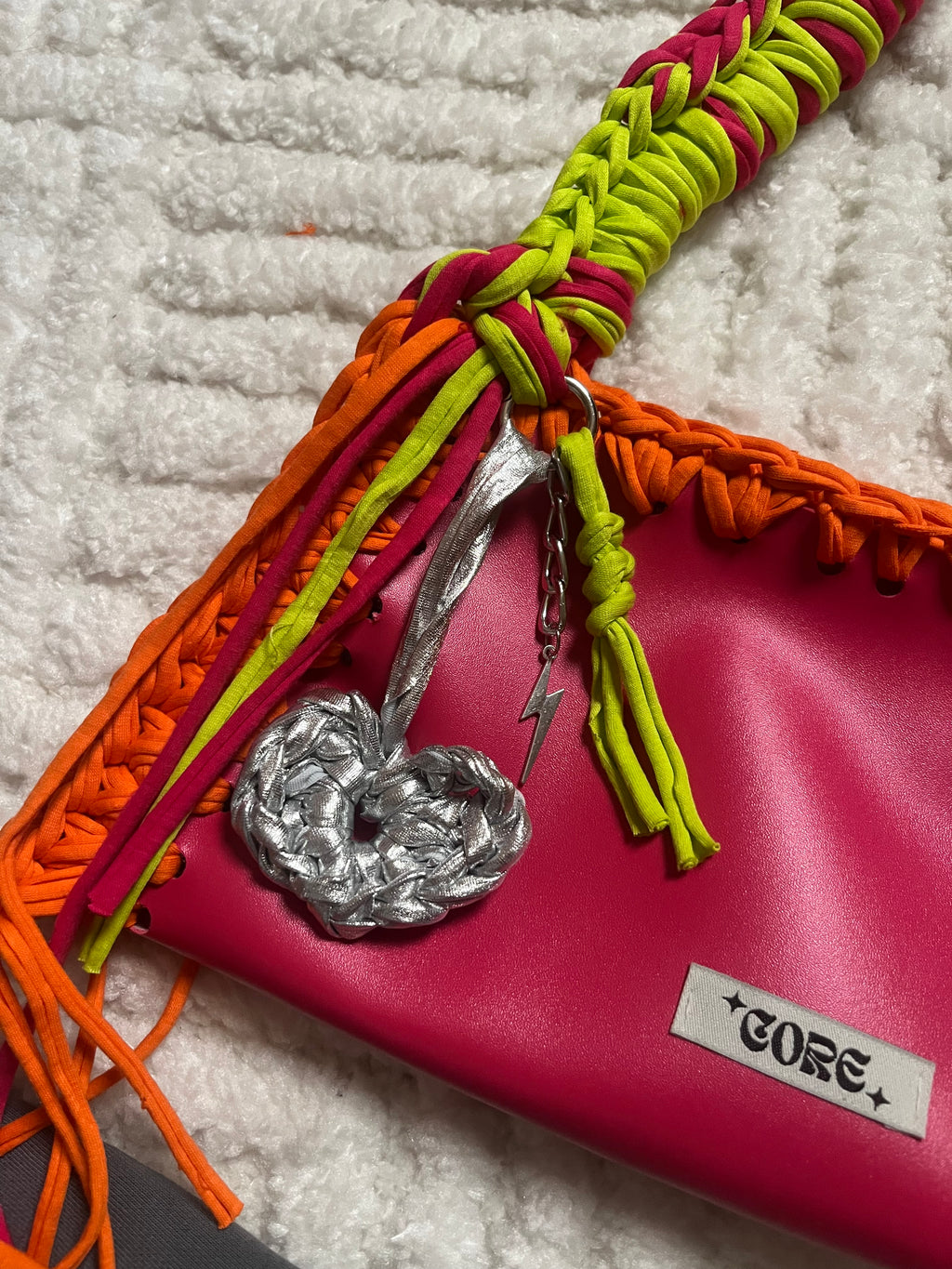 Metallic charm